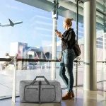 Grand sac de voyage pliable avec aeroport Grand sac de voyage pliable avec compartiment chaussures vue à l'aeroport