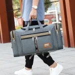 Grand sac de voyage sport, pratique et polyvalent porté main Grand sac de voyage sport, pratique et polyvalent porté main