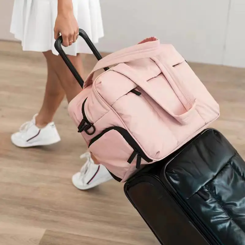 Sac de voyage cabine pour femmes matelassé sur valise