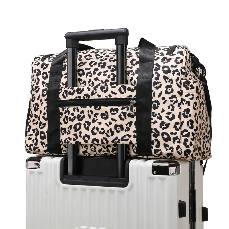Sac de voyage pour femme avec bandoulière sur valise