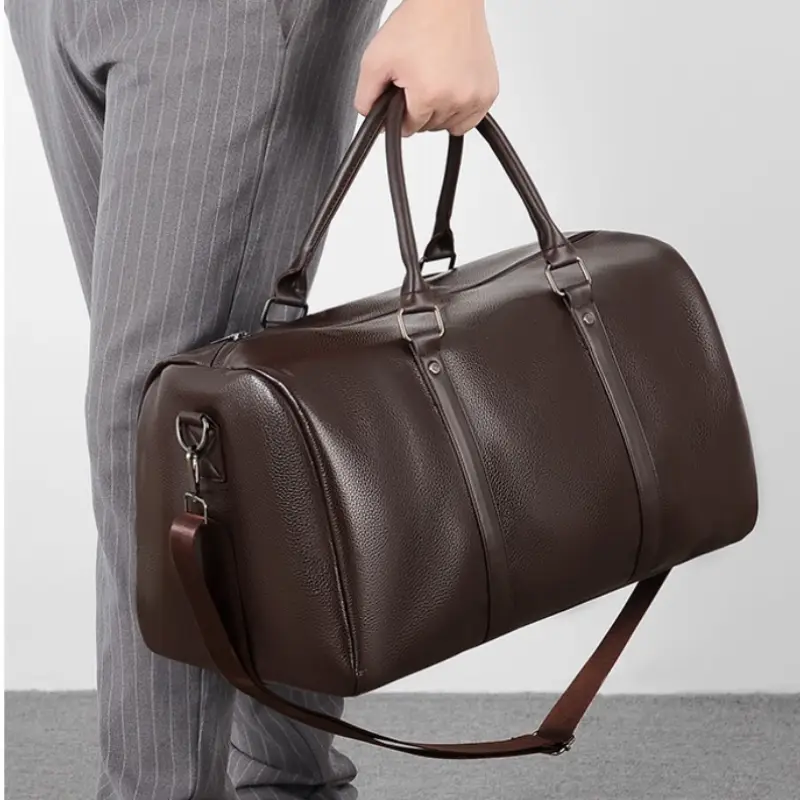 Sac de voyage pour homme classe et imperméable porté main