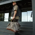 Sac de voyage pour homme en toile et cuir modèle Sac de voyage pour homme en toile et cuir modèle