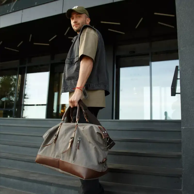 Sac de voyage pour homme en toile et cuir modèle