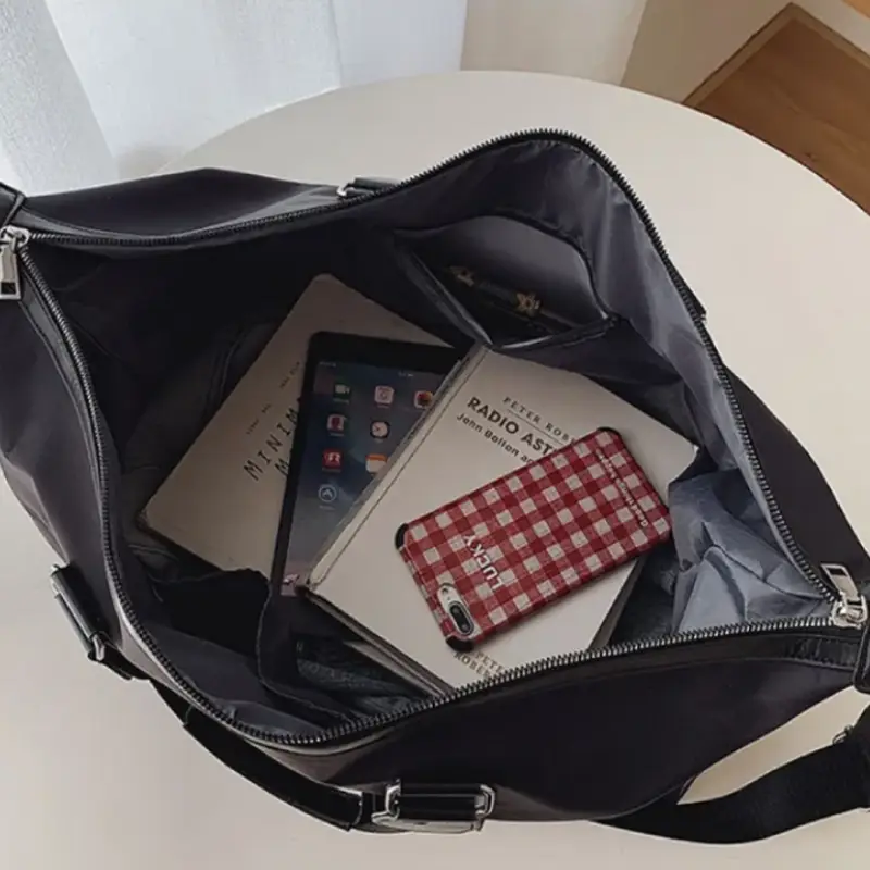 Sac de voyage pour homme noir style pratique interieur