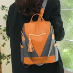 Petit sac à dos tendance anti-volorange et gris porté épaule Petit sac à dos tendance anti-volorange et gris porté épaule