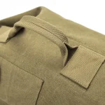 Sac à dos de voyage 40l résistant pour baroudeurs‌ détail poignée