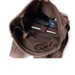 Sac à dos de voyage vintage en toile et cuir parfait pour aventuriers inerieur Sac à dos de voyage vintage en toile et cuir parfait pour aventuriers inerieur