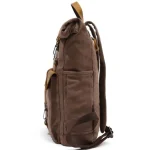 Sac à dos de voyage vintage en toile et cuir parfait pour aventuriers profil Sac à dos de voyage vintage en toile et cuir parfait pour aventuriers profil