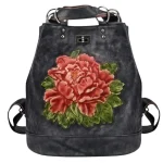 Sac à dos pour femme en cuir vintage style rétro avec motif floral noir Sac à dos pour femme en cuir vintage style rétro avec motif floral noir
