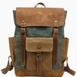 Sac à dos pour homme look vintage en toile cirée et cuir imperméable vert Sac à dos pour homme look vintage en toile cirée et cuir imperméable vert