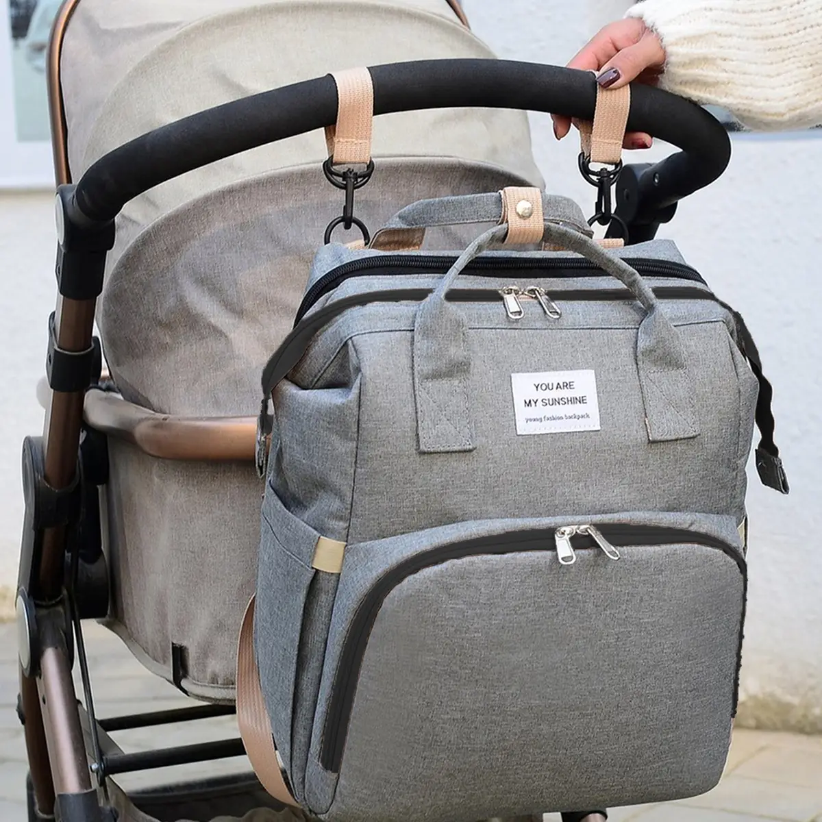 Sac à dos sac à langer avec station de changement poussette