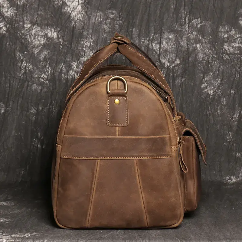 Sac de voyage en cuir marron profil