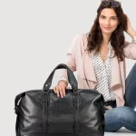 Sac de voyage en cuir noir avec femme Sac de voyage en cuir noir avec femme