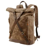 vertSac à dos randonnée vintage en toile imperméable pour aventuriers profil vertSac à dos randonnée vintage en toile imperméable pour aventuriers profil