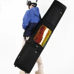 Sac à dos ski alpin avec roulettes pour transports de skis porté dos noir