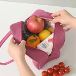Sac isotherme souple compact et résistant rose ouvert