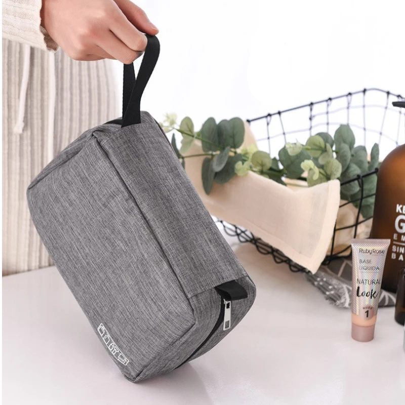 Trousse de toilette de voyage à suspendre fermée - grise